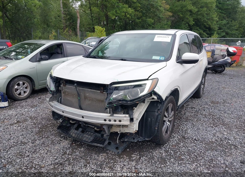 2016 HONDA PILOT EX-L VIN: 5FNYF6H59GB080401