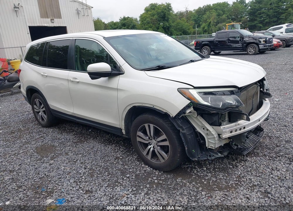 2016 HONDA PILOT EX-L VIN: 5FNYF6H59GB080401