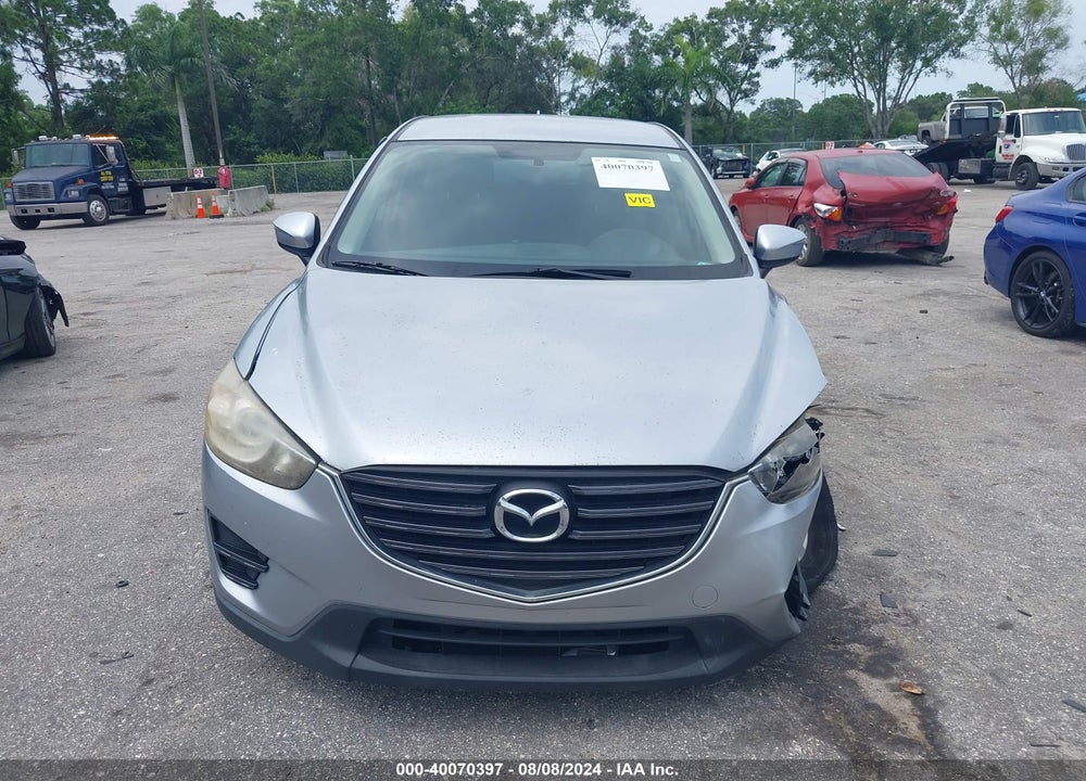 2016 MAZDA CX-5 SPORT VIN: JM3KE2BY7G0693112