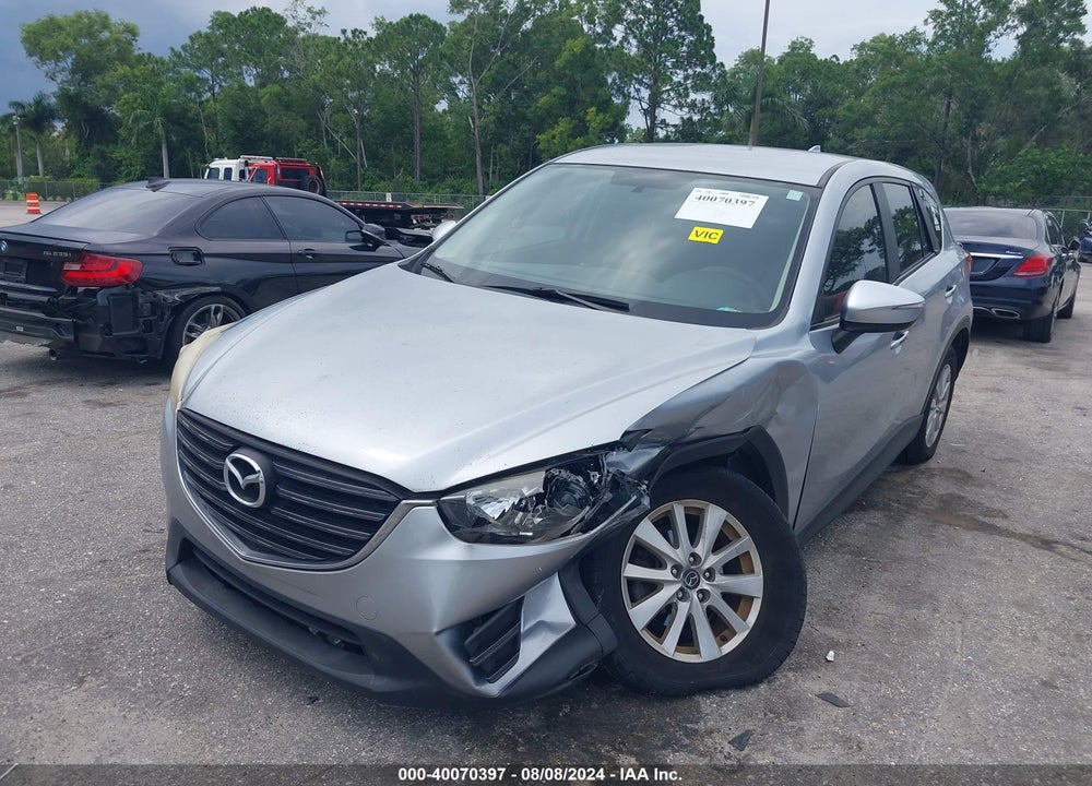 2016 MAZDA CX-5 SPORT VIN: JM3KE2BY7G0693112