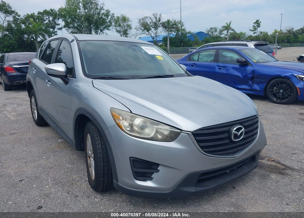 2016 MAZDA CX-5 SPORT VIN: JM3KE2BY7G0693112