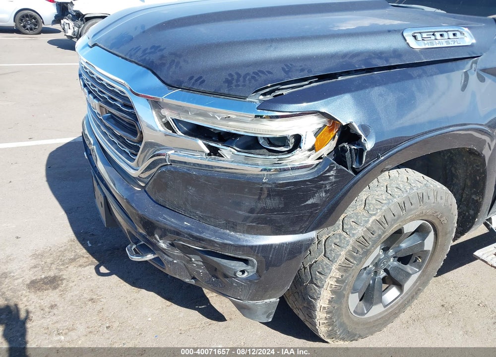2019 RAM 1500 LIMITED 4X4 5'7 BOX VIN: 1C6SRFHT7KN801599