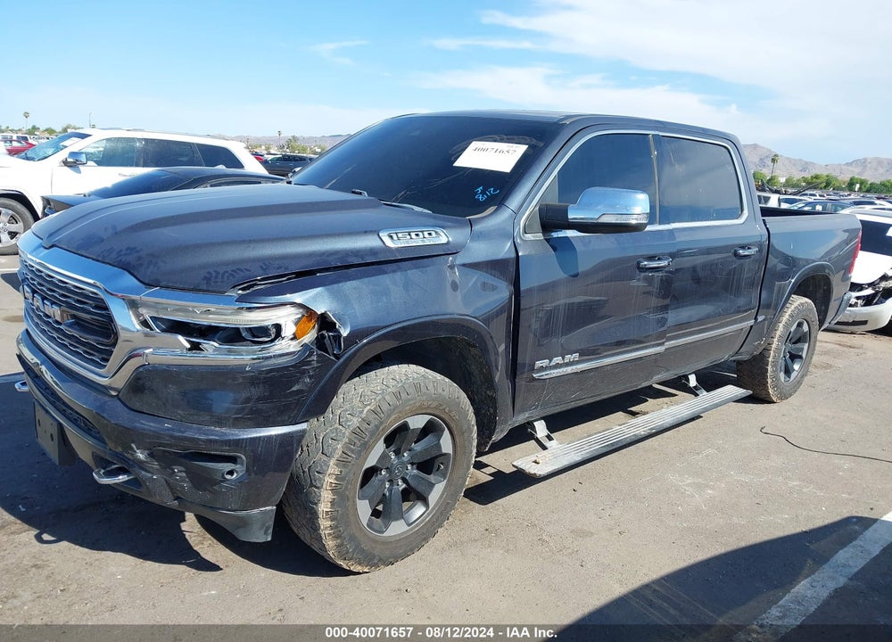 2019 RAM 1500 LIMITED 4X4 5'7 BOX VIN: 1C6SRFHT7KN801599