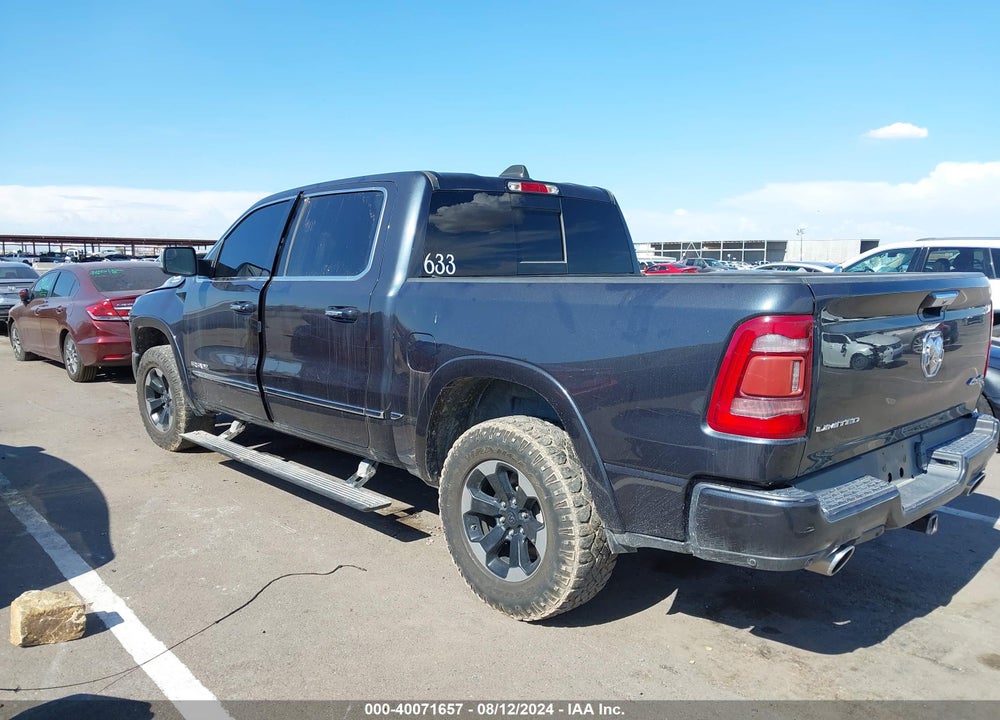2019 RAM 1500 LIMITED 4X4 5'7 BOX VIN: 1C6SRFHT7KN801599