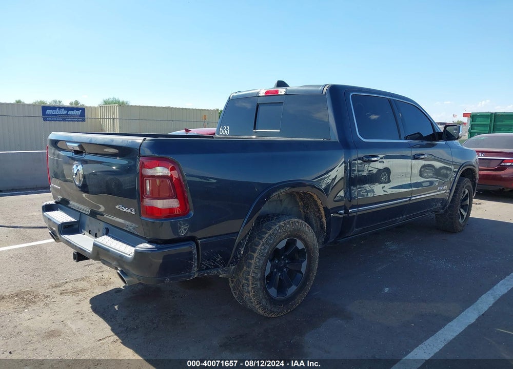 2019 RAM 1500 LIMITED 4X4 5'7 BOX VIN: 1C6SRFHT7KN801599