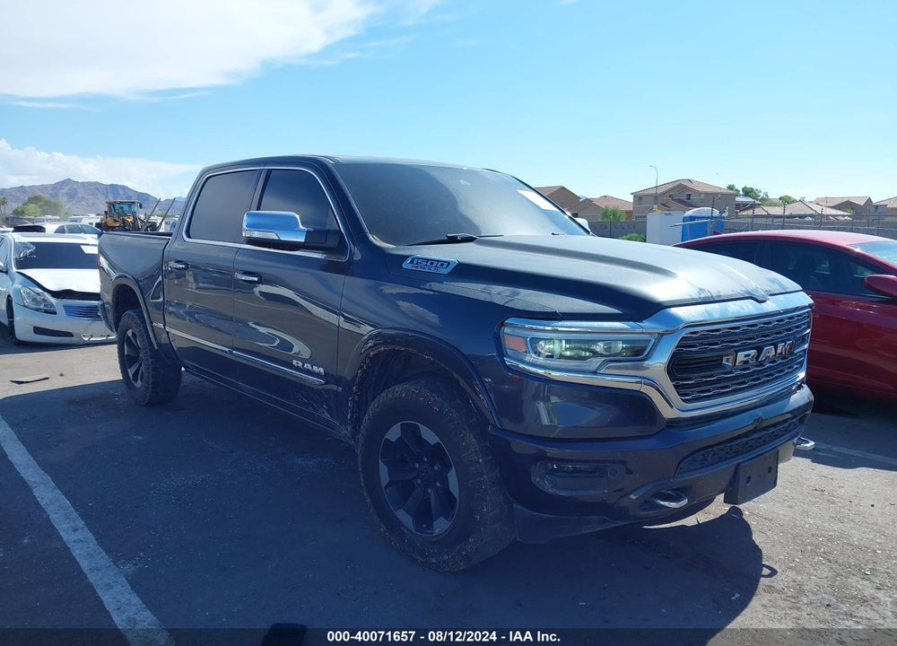 2019 RAM 1500 LIMITED 4X4 5'7 BOX VIN: 1C6SRFHT7KN801599