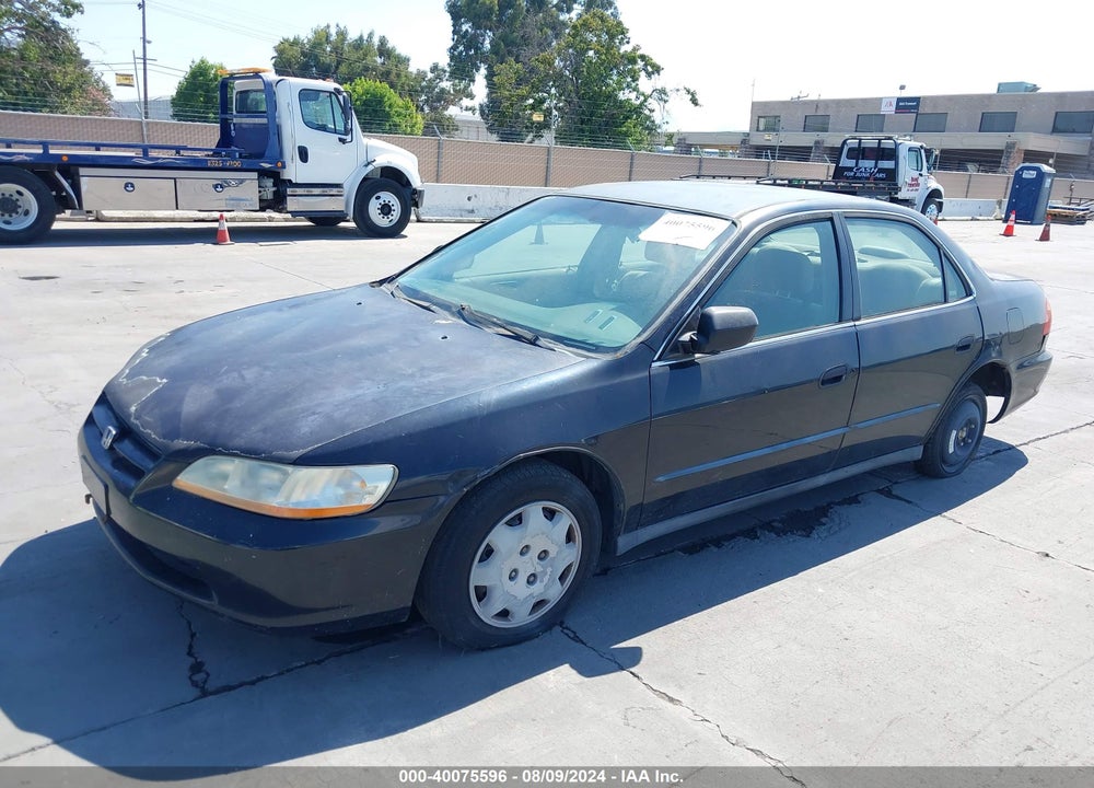 2000 HONDA ACCORD 2.3 LX VIN: JHMCG6555YC023606