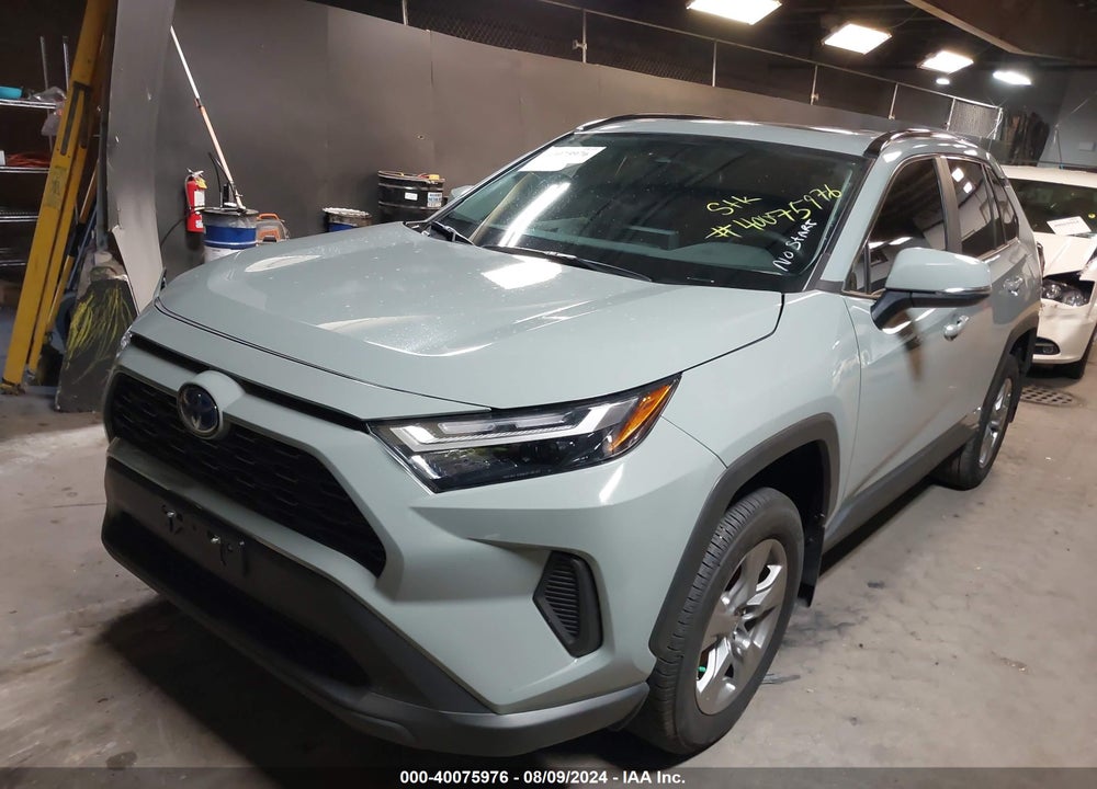 2023 TOYOTA RAV4 HYBRID XLE VIN: 4T3RWRFV1PU102474