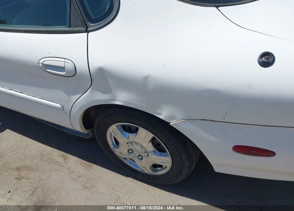 1999 FORD TAURUS VIN: 1FAFP53S9XG207381