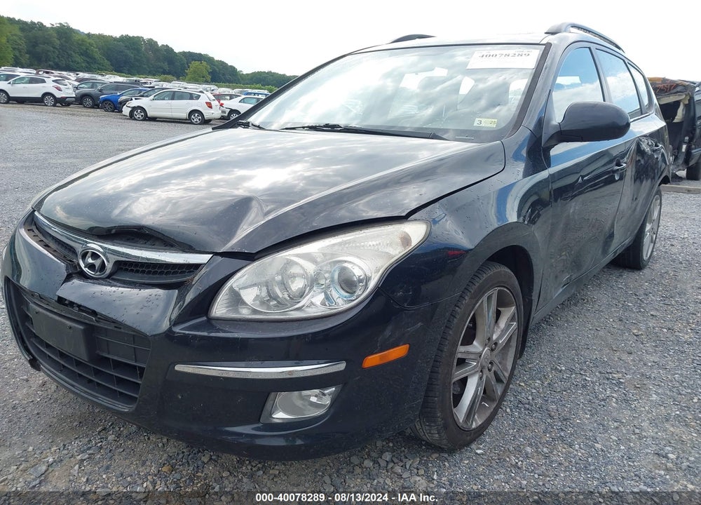2010 HYUNDAI ELANTRA TOURING VIN: KMHDC8AE4AU063254