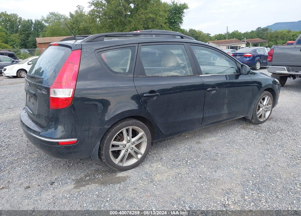 2010 HYUNDAI ELANTRA TOURING VIN: KMHDC8AE4AU063254