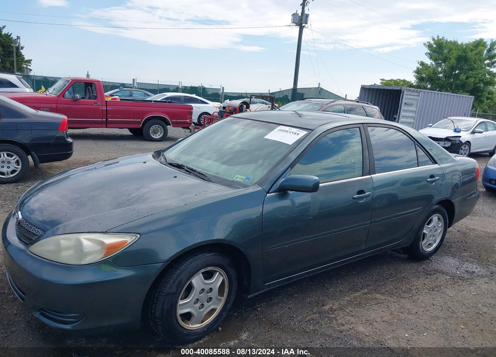 2002 TOYOTA CAMRY LE VIN: JTDBE32K720028438