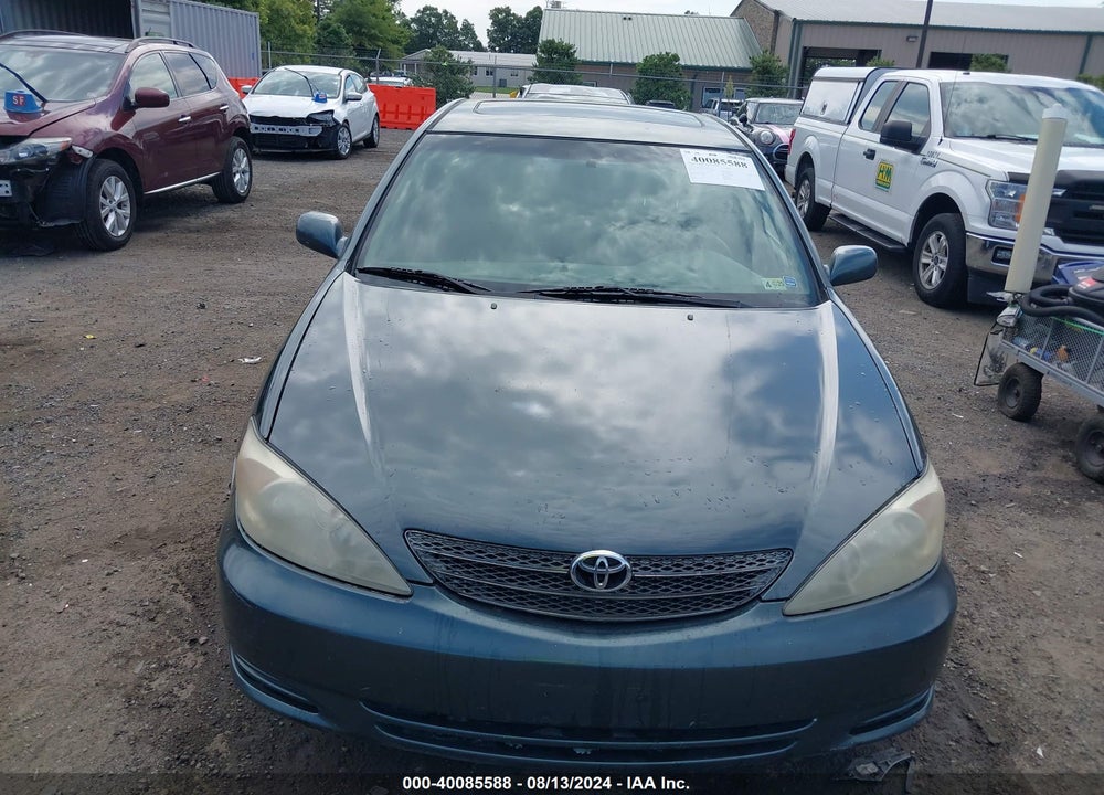 2002 TOYOTA CAMRY LE VIN: JTDBE32K720028438