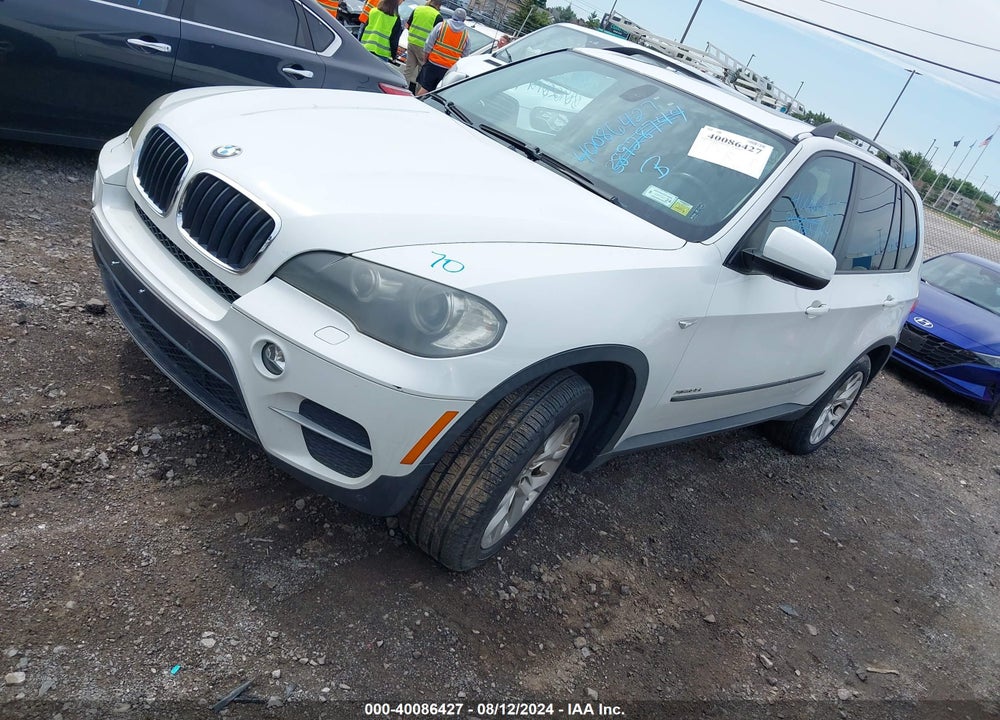 2011 BMW X5 XDRIVE35I/XDRIVE35I PREMIUM/XDRIVE35I SPORT ACTIVITY VIN: 5UXZV4C52BL740026