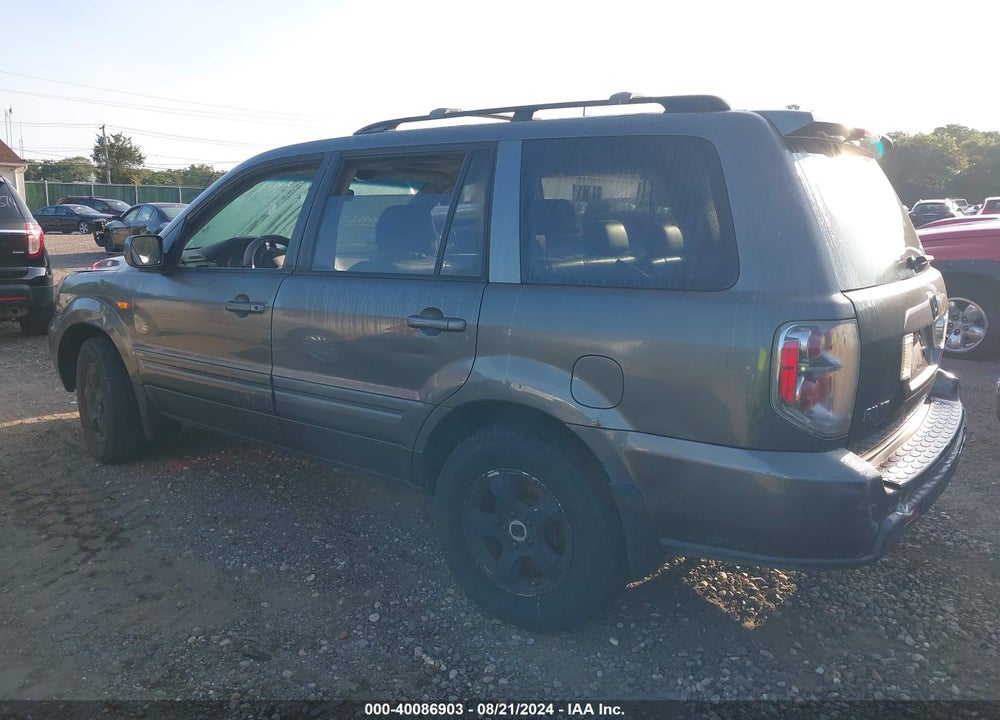 2007 HONDA PILOT EX-L VIN: 2HKYF185X7H511820