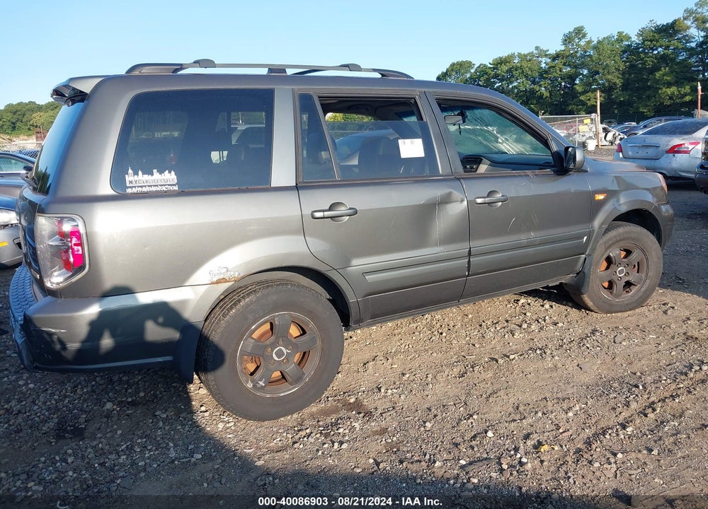 2007 HONDA PILOT EX-L VIN: 2HKYF185X7H511820
