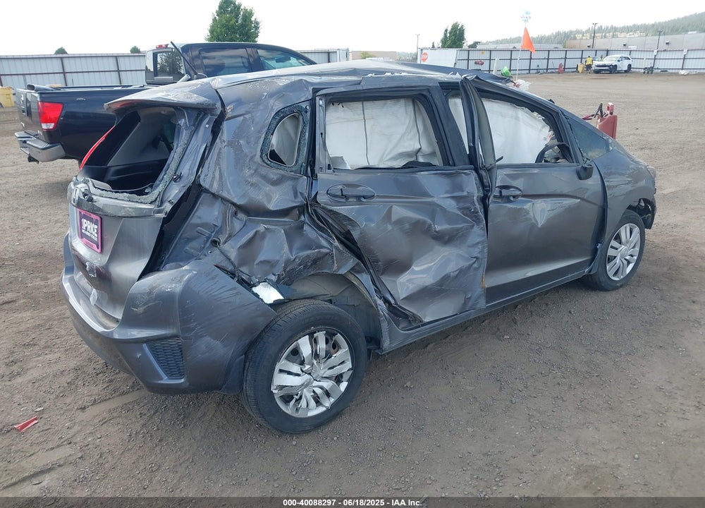 2015 HONDA FIT VIN: 3HGGK5H54FM714873