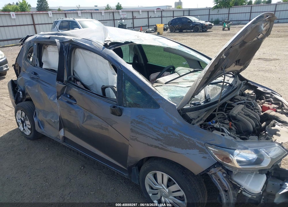 2015 HONDA FIT VIN: 3HGGK5H54FM714873