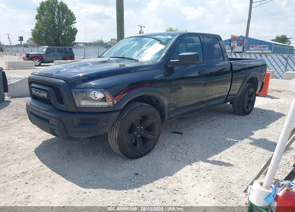 2023 RAM 1500 CLASSIC WARLOCK QUAD CAB 4X4 6'4 BOX VIN: 1C6RR7GG7PS556272