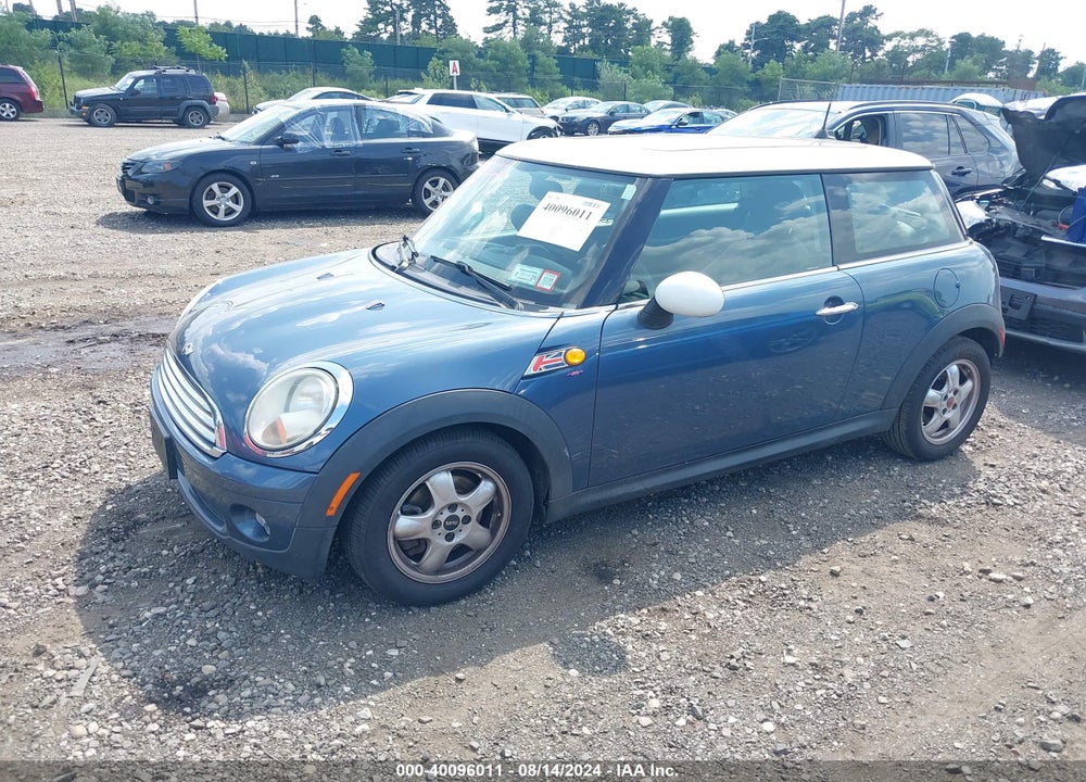 2010 MINI COOPER VIN: WMWMF3C53ATZ27595