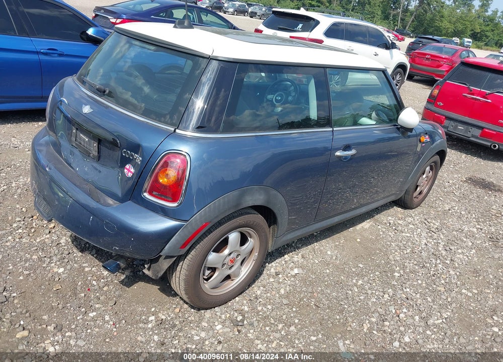 2010 MINI COOPER VIN: WMWMF3C53ATZ27595