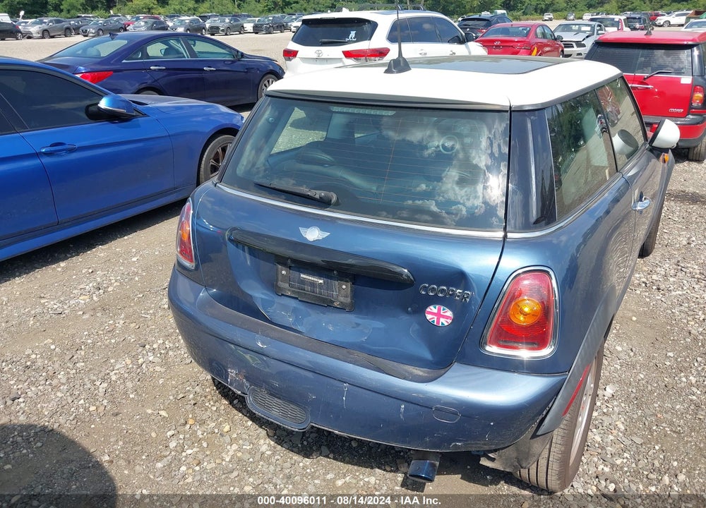 2010 MINI COOPER VIN: WMWMF3C53ATZ27595