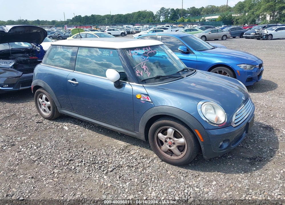 2010 MINI COOPER VIN: WMWMF3C53ATZ27595