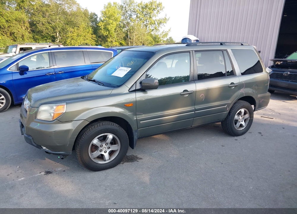 2007 HONDA PILOT EX-L VIN: 5FNYF18527B027591