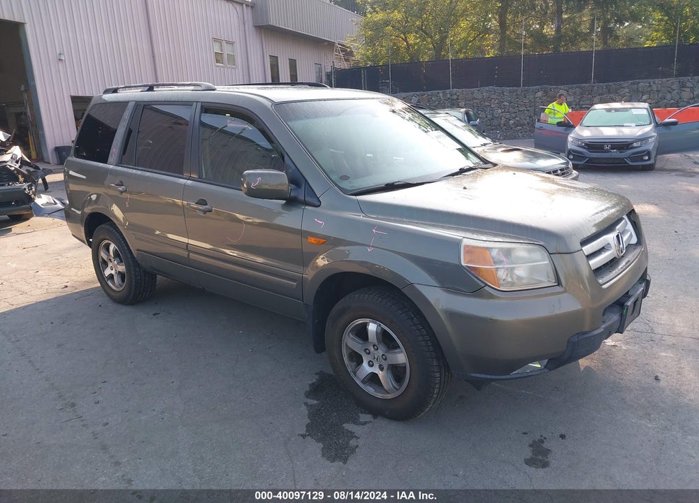 2007 HONDA PILOT EX-L VIN: 5FNYF18527B027591