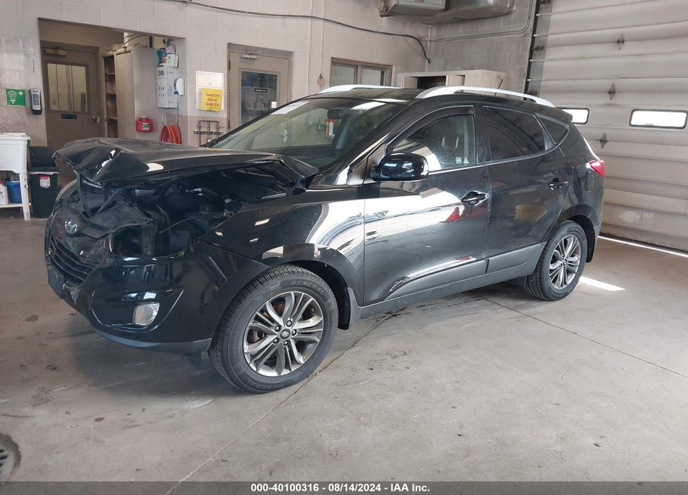 2014 HYUNDAI TUCSON SE VIN: KM8JUCAG4EU897860
