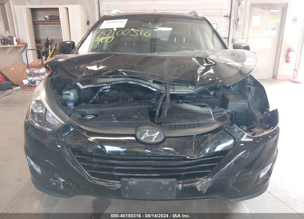 2014 HYUNDAI TUCSON SE VIN: KM8JUCAG4EU897860