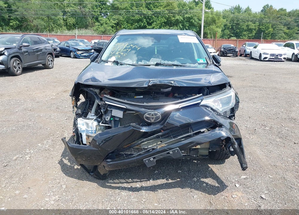 2018 TOYOTA RAV4 XLE VIN: 2T3RFREV9JW804857