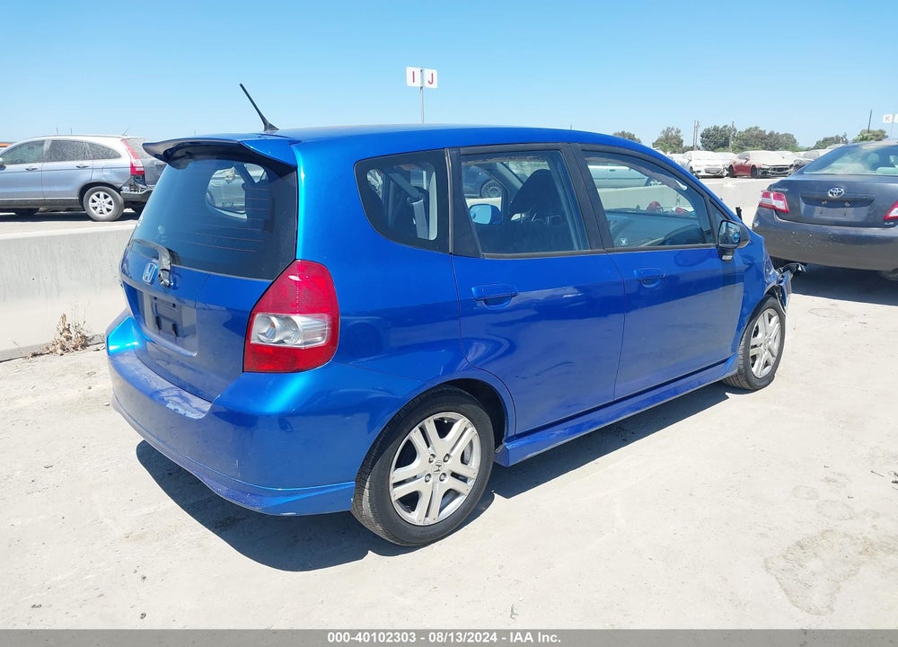 2007 HONDA FIT VIN: JHMGD38647S011447