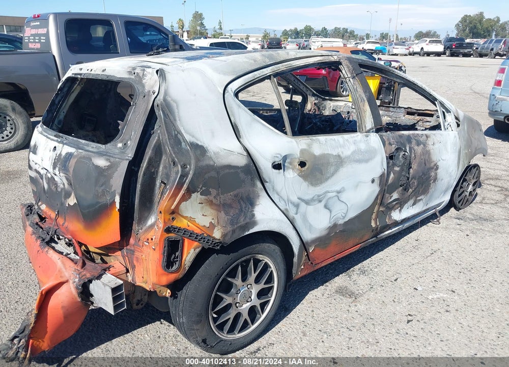2012 TOYOTA PRIUS C THREE VIN: JTDKDTB38C1010084