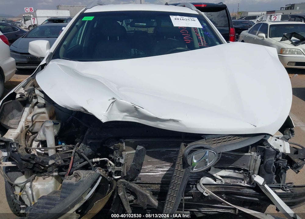 2014 HYUNDAI TUCSON SE VIN: KM8JUCAG9EU871240