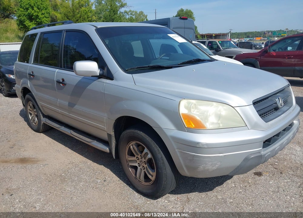 2004 HONDA PILOT EX VIN: 2HKYF18414H558429