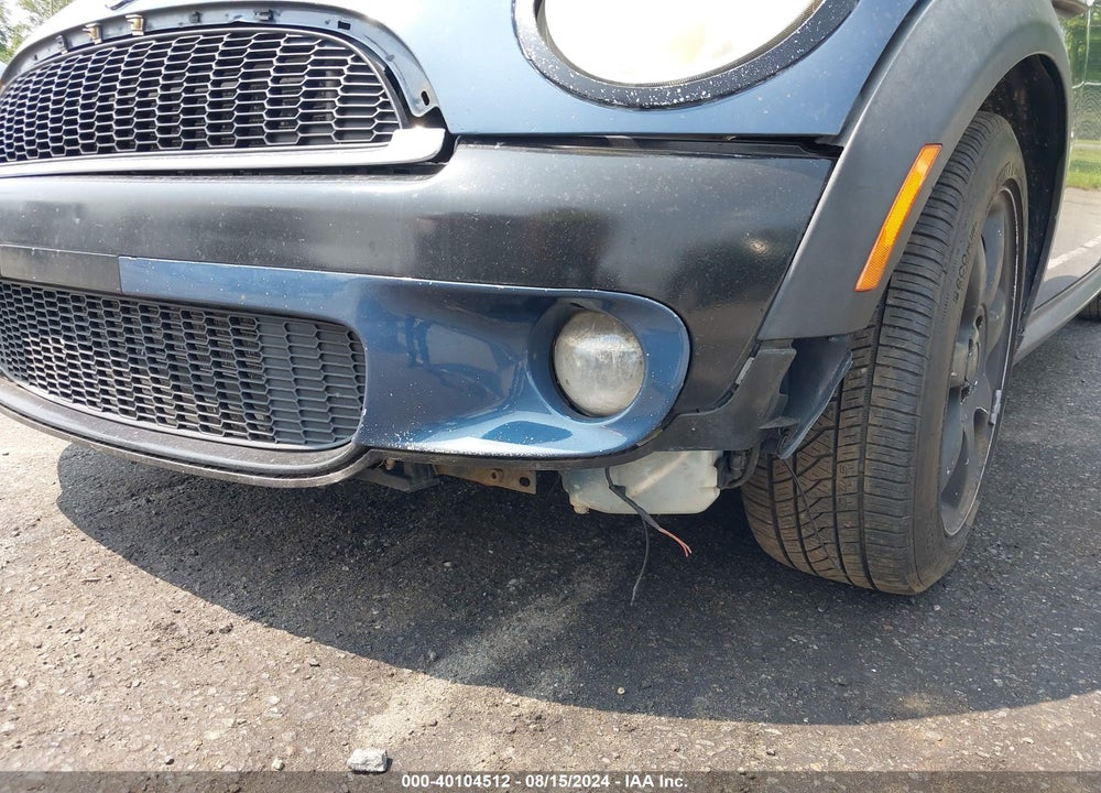 2009 MINI COOPER S VIN: WMWMF73559TT99013