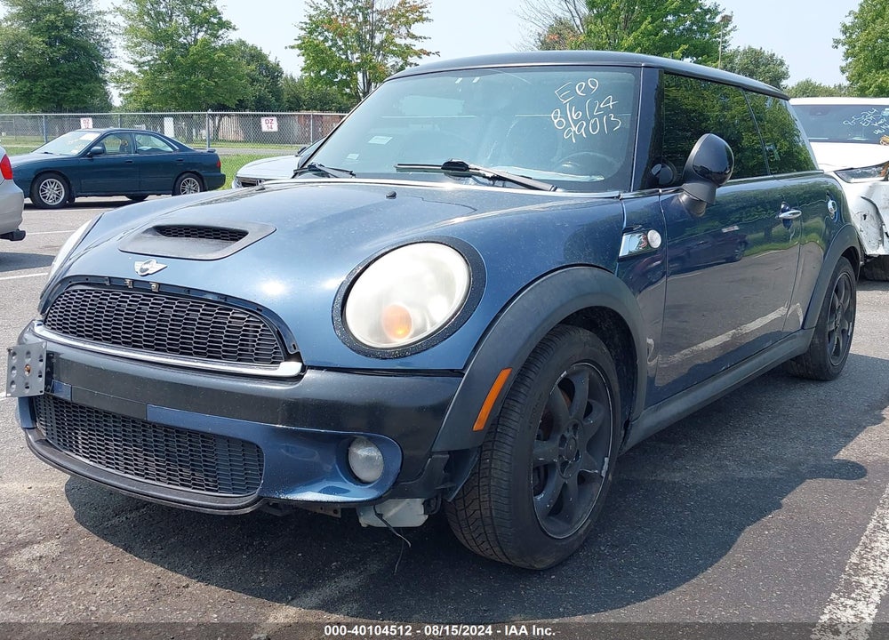 2009 MINI COOPER S VIN: WMWMF73559TT99013