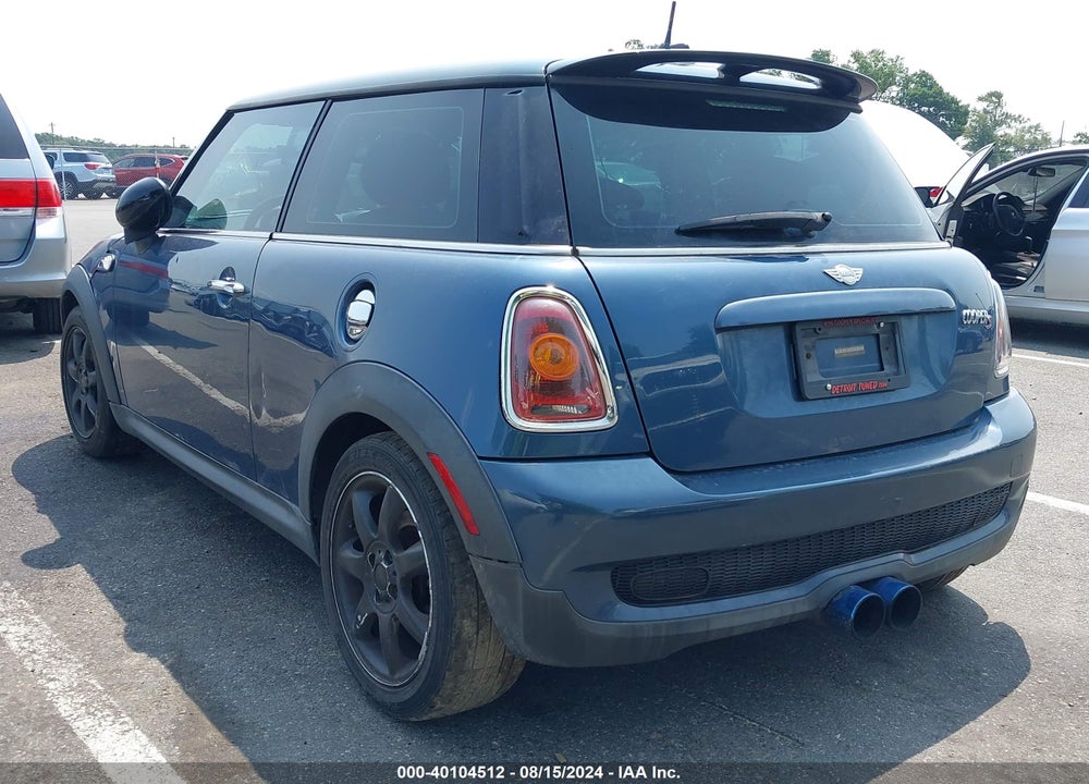 2009 MINI COOPER S VIN: WMWMF73559TT99013