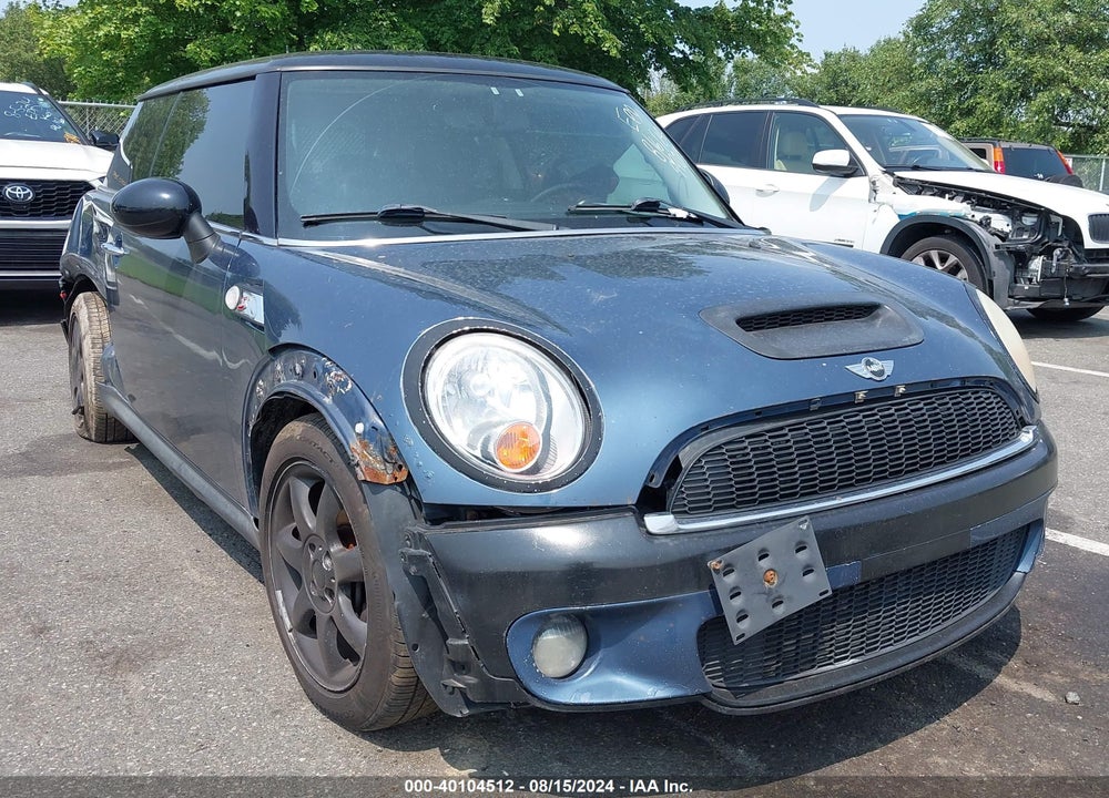 2009 MINI COOPER S VIN: WMWMF73559TT99013