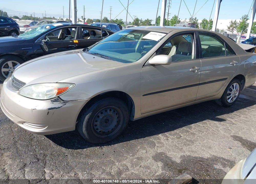 2002 TOYOTA CAMRY LE VIN: JTDBE32K220101988