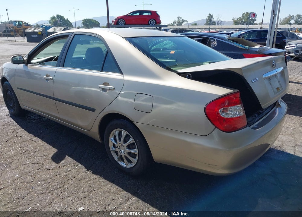 2002 TOYOTA CAMRY LE VIN: JTDBE32K220101988
