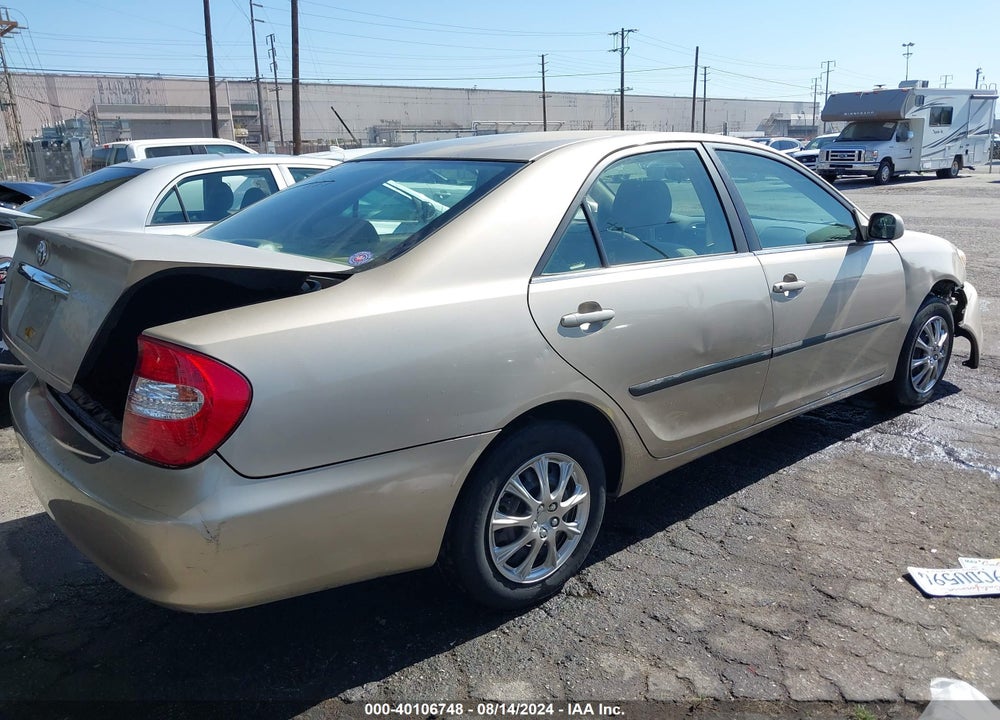2002 TOYOTA CAMRY LE VIN: JTDBE32K220101988