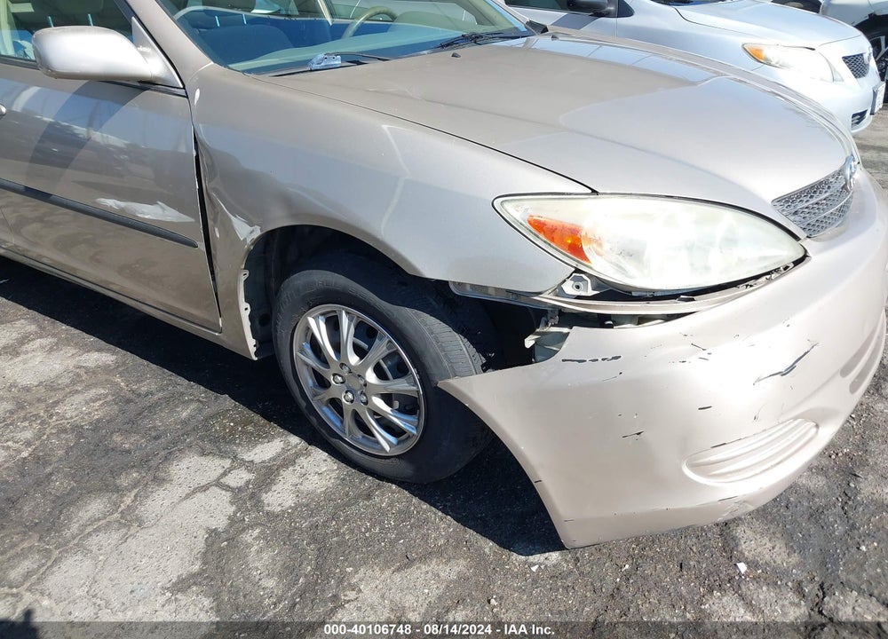 2002 TOYOTA CAMRY LE VIN: JTDBE32K220101988