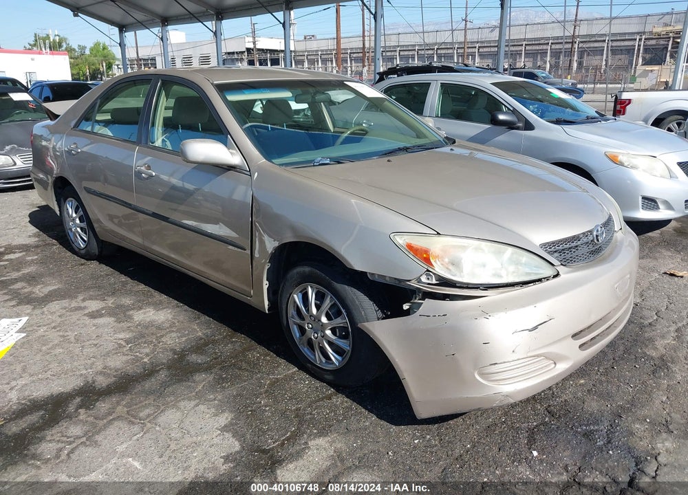 2002 TOYOTA CAMRY LE VIN: JTDBE32K220101988