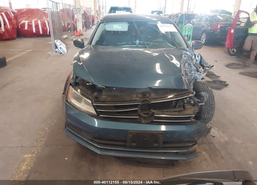 2015 VOLKSWAGEN JETTA 1.8T SE VIN: 3VWD17AJ7FM285510