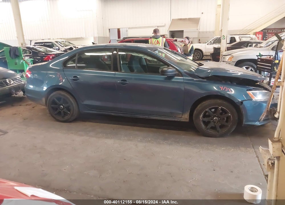 2015 VOLKSWAGEN JETTA 1.8T SE VIN: 3VWD17AJ7FM285510