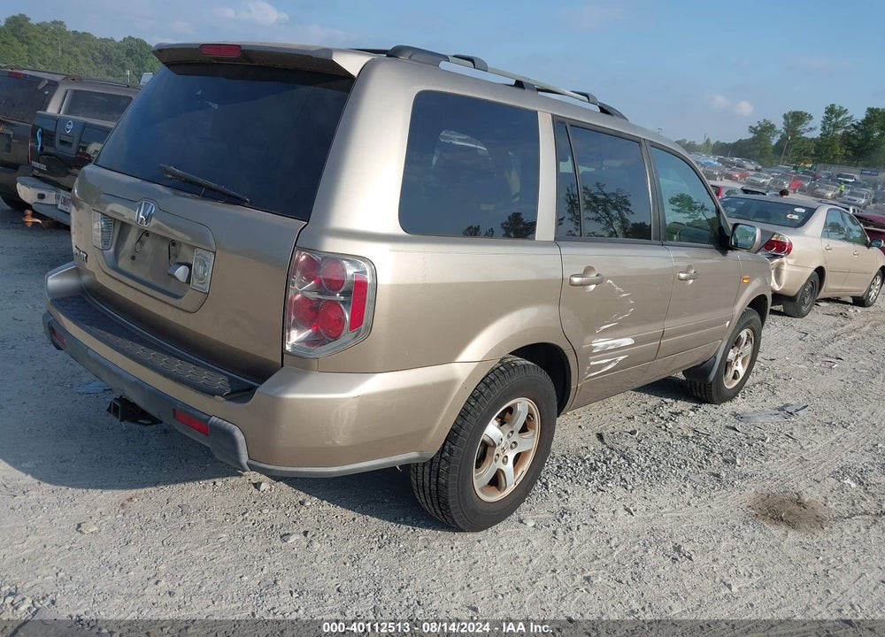 2006 HONDA PILOT EX-L VIN: 5FNYF287X6B000869