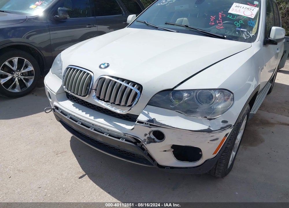 2013 BMW X5 XDRIVE35I/XDRIVE35I PREMIUM/XDRIVE35I SPORT ACTIVITY VIN: 5UXZV4C58D0E10205