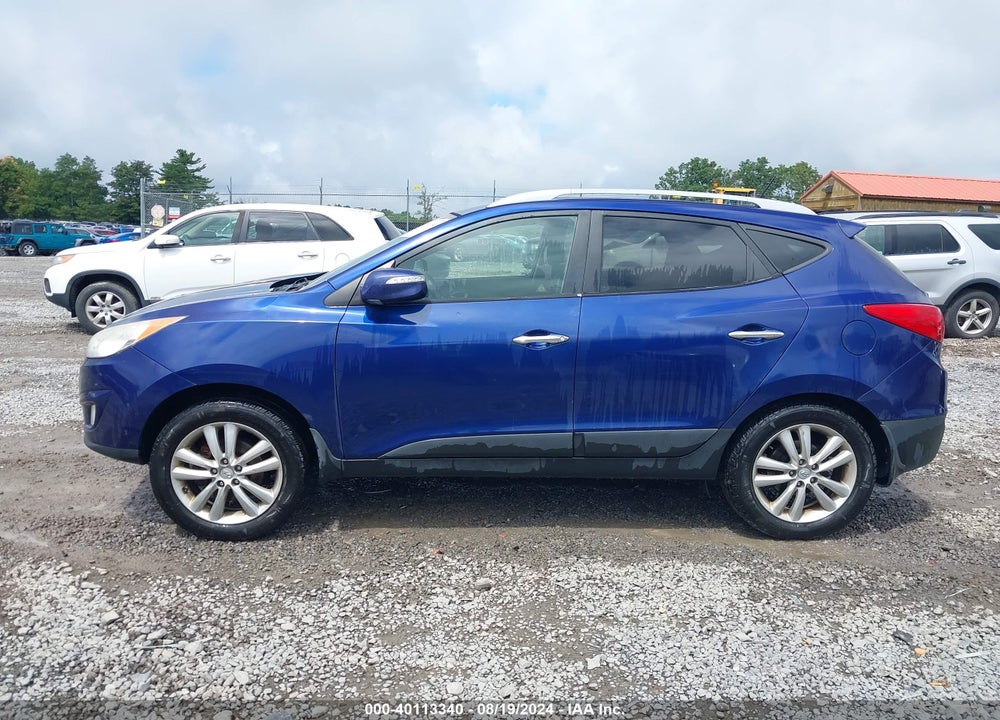 2010 HYUNDAI TUCSON LIMITED VIN: KM8JUCAC4AU063837